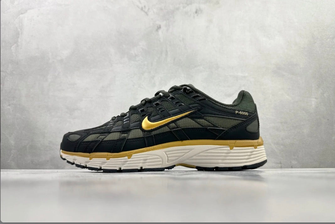 Nike P-6000 schwarz-gold